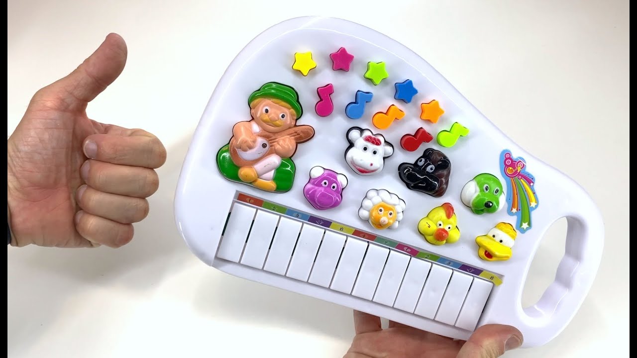 Brinquedo infantil pianinho musical fazendinha musicas sons de animais luz  e alca