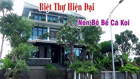 Biệt Thự Hiện Đại Đẹp Với Non Bộ Bể Cá Koi Cây Xanh Xung Quanh