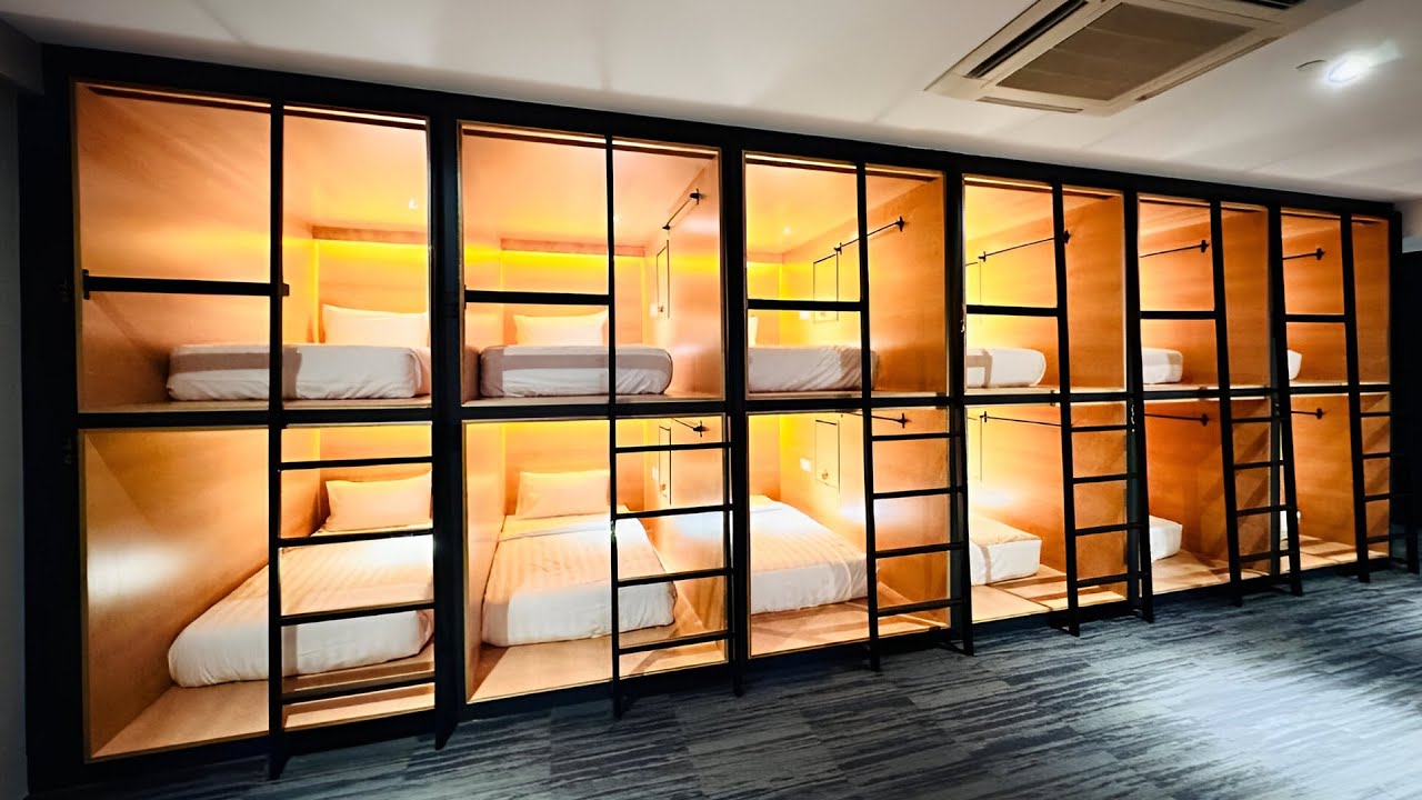 Остановитесь в малазийском капсульном отеле за 20 долларов в Куала-Лумпуре | The Bed Capsule Hotel