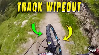 Biker's Race Track Wipeout After Big Jump