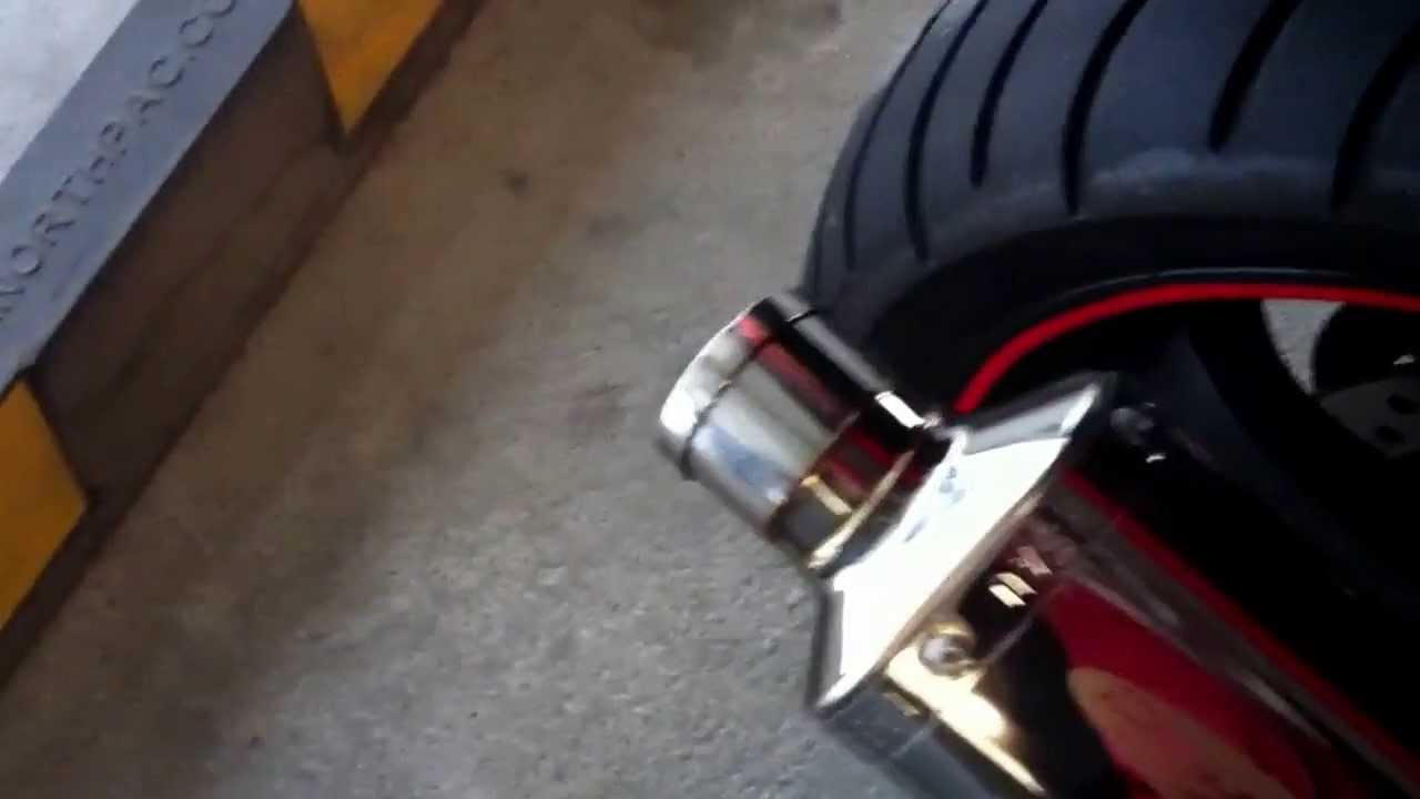 VFR800 with Delkevic 13" trioval stainless exhaust, baffle removed