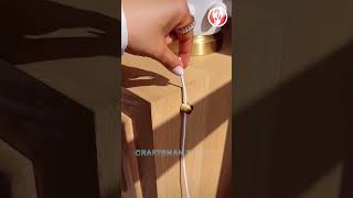 Small tool for securing charging cables on your desktop