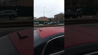 AN UNMARKED NYPD IMPALA RESPONDING CODE 3