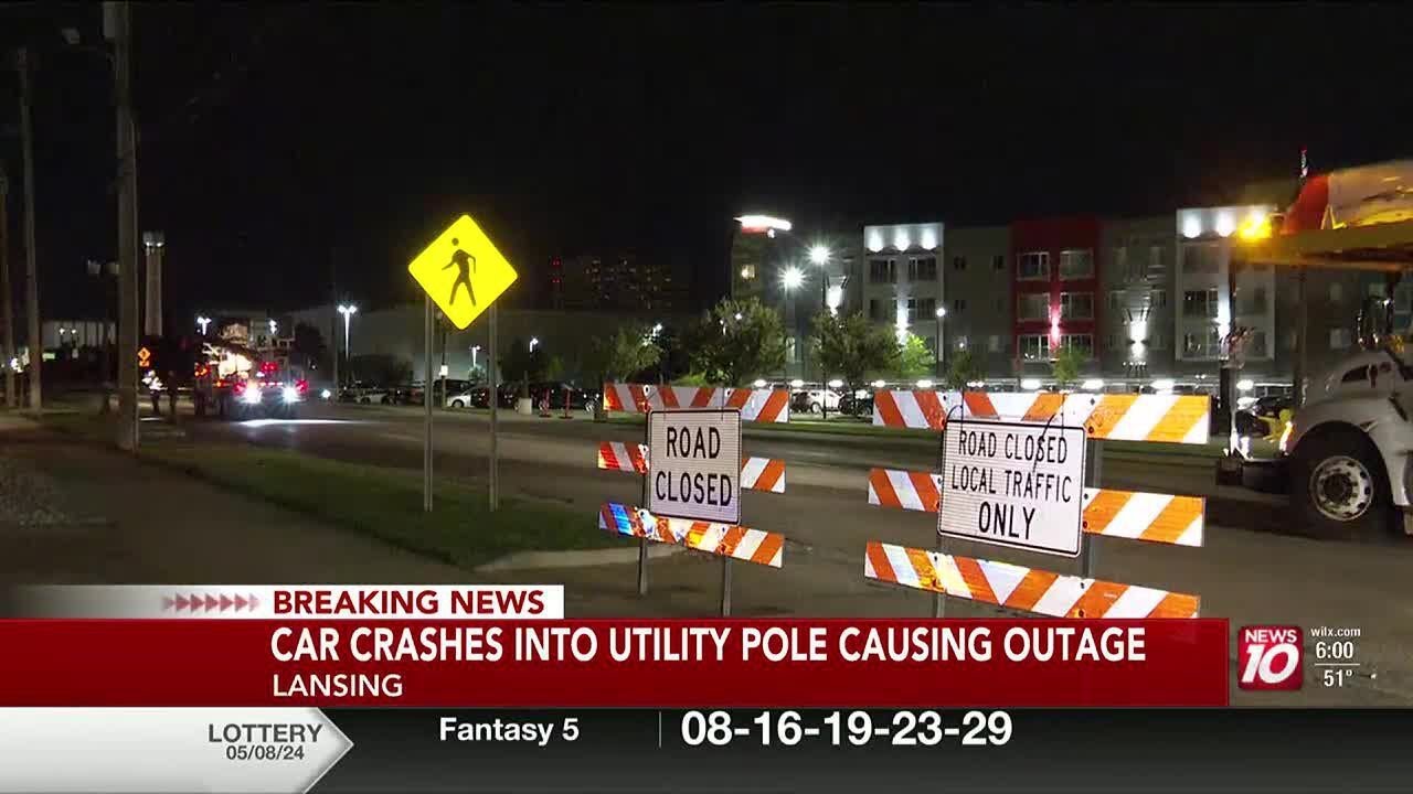 Car crashes into utility pole, causes power outage in Lansing - YouTube