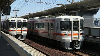 春田駅で交換する普通列車と快速列車