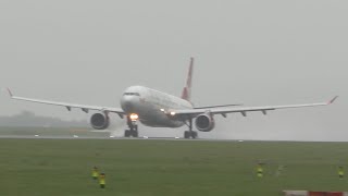 Virgin Atlantic A330 G-VINE to Atlanta from a very wet 23L giving lots of spray