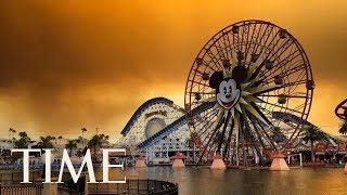 Visitors at california's disneyland are sharing shocking photos of the
theme park under an ominous orange sky as deadly wildfires rage across
state. subs...