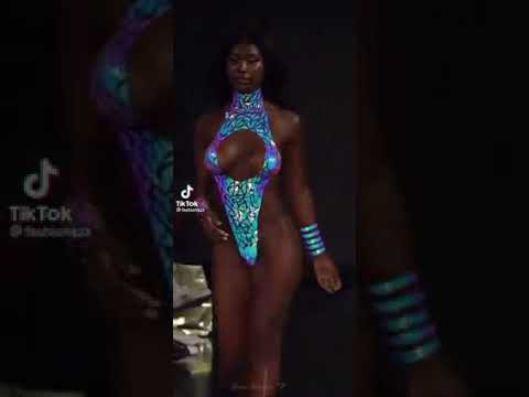 beautiful black woman modeling swimsuit on catwalk