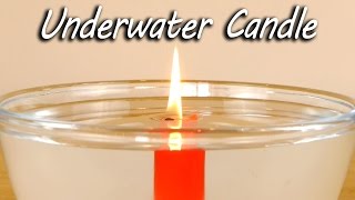 How to burn a candle underwater. Simple science trick. Watch the flame continue to burn beneath the water level as the wax holds ...