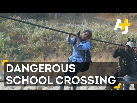 Nepali Children Cable Across Rivers To Get To School
