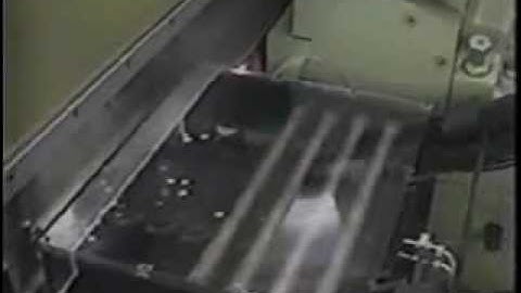 CRI - Centerless Grinder 340-20 Thrufeed Shafts Magazine to Conveyor Loading System