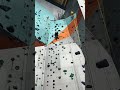 5 year old boy rock climbing (boltering)