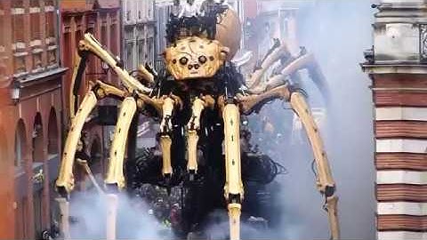 Giant mechanical creatures delight spectators as they roam central Toulouse