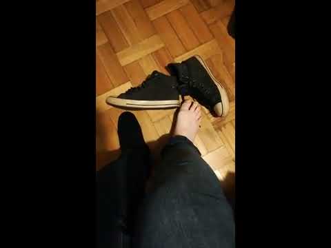 Teen boy feet and socks in converse