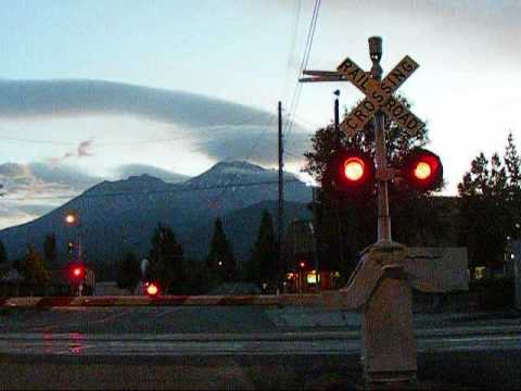 Northbound Amtrak Coast Starlight #14 highballs past Alma Street in Mount Shasta, California on the morning of September 13, 2009 at 6:31 AM.