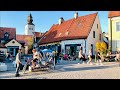 Sweden Walks: Visby, Gotland. Streets and people in  medieval, world heritage town