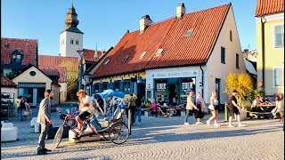Sweden Walks: Visby, Gotland. Streets and people in  medieval, world heritage town