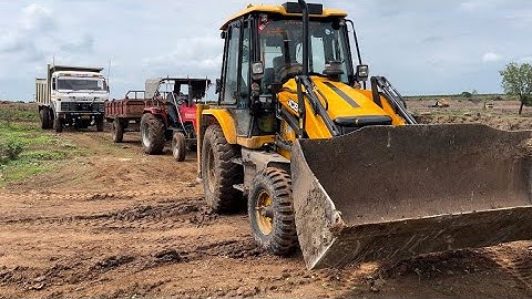 Jcb 3dx backhoe murum loading in tata tipper 1618 and mahindra tractor