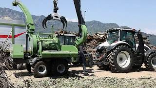 PTH 900 G Pezzolato drum wood chipper driven by VALTRA 250 Hp tractor