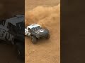 Traxxas slash drifts on baseball field