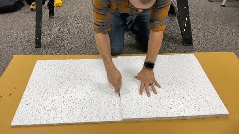 Cutting a ceiling tile to fit