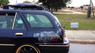 Escort Wagon with Gold Trim & Satellite on 20s