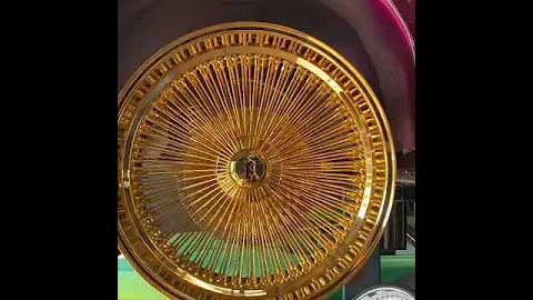 Gold Dayton’s on convertible cutlass