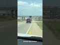 Dump truck crashes into bridge