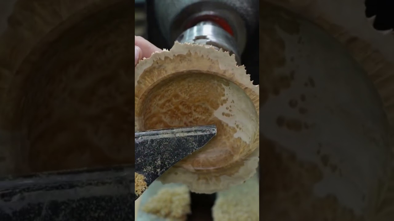 Woodturning a brain grained bowl.