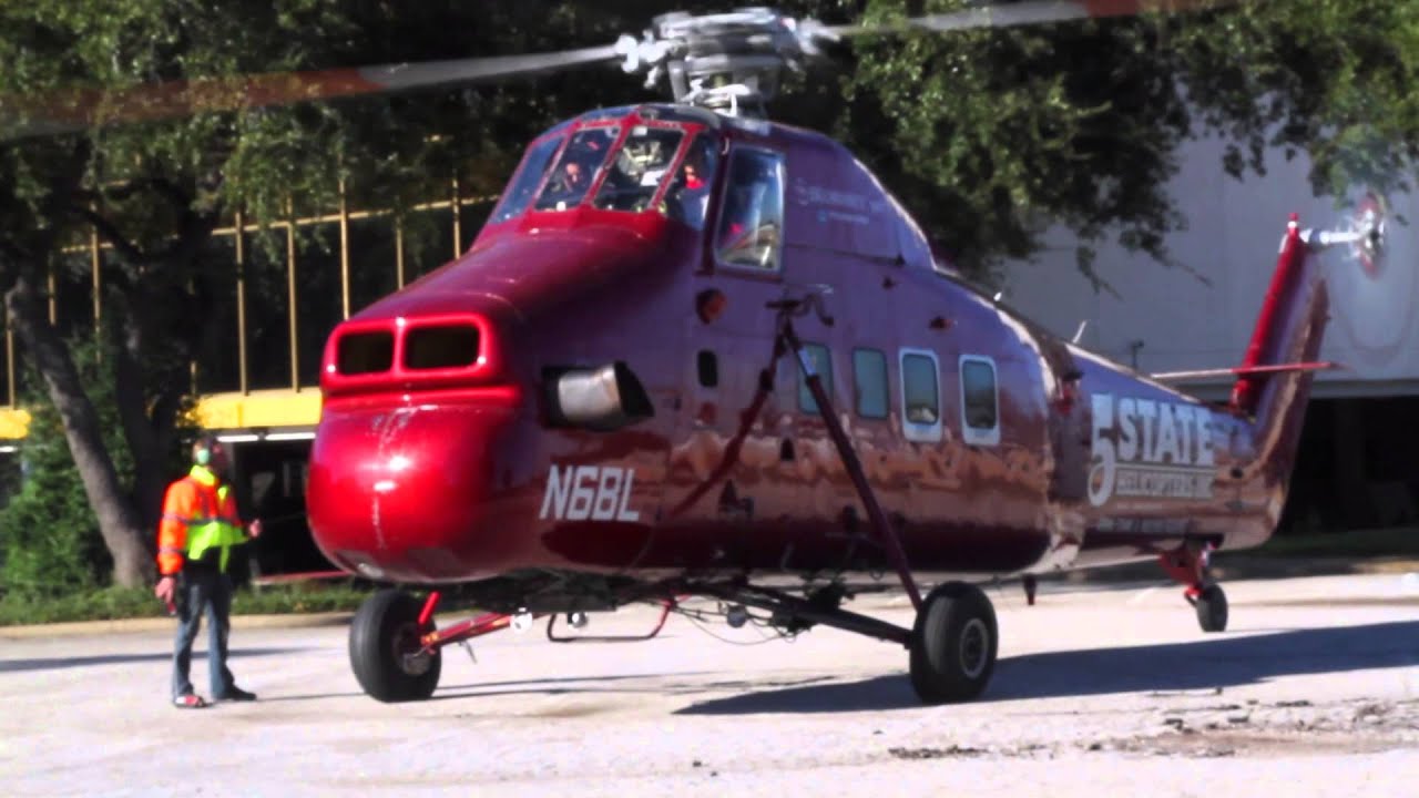 High-Rise Signage Helicopter Job by Starlite Sign