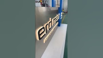 Large freestanding light box sign, brilliantly illuminated through push-through lettering.