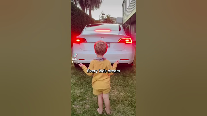 Kids LOVE the Tesla light show 🥰 #shorts #teslamodel3