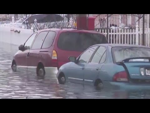 Queens residents cleaning up after severe flooding - YouTube