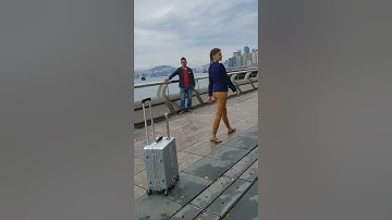 Airwheel SR3 smart suitcase walks along the street with you in the journey