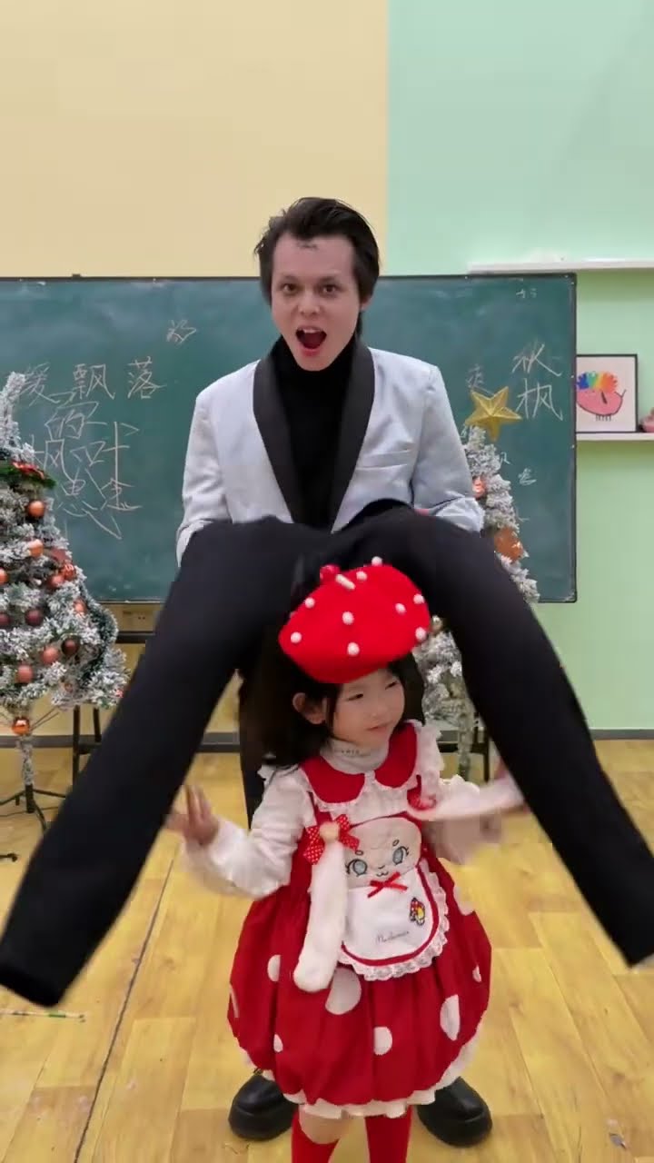 COCO is a strongman! She can even carry the clown