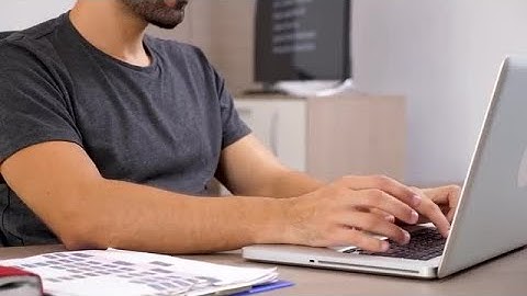 Man Typing On His Laptop Stock Video