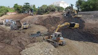 Rehabilitation of canals using many machinesSHANTUI SD16L Bulldozer Pushing Topsoil14