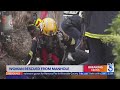 First responders pull woman rescue woman trapped down manhole in oc