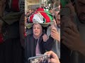 والدة الشهيد الطفل ادم سيد صالح دهمان ١٥ عاما تحمل جثمان نجلها خلال تشييعه في مخيم الدهيشة 