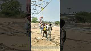 Riding Ropes to Height: How Crews Access a Transmission Tower for Construction