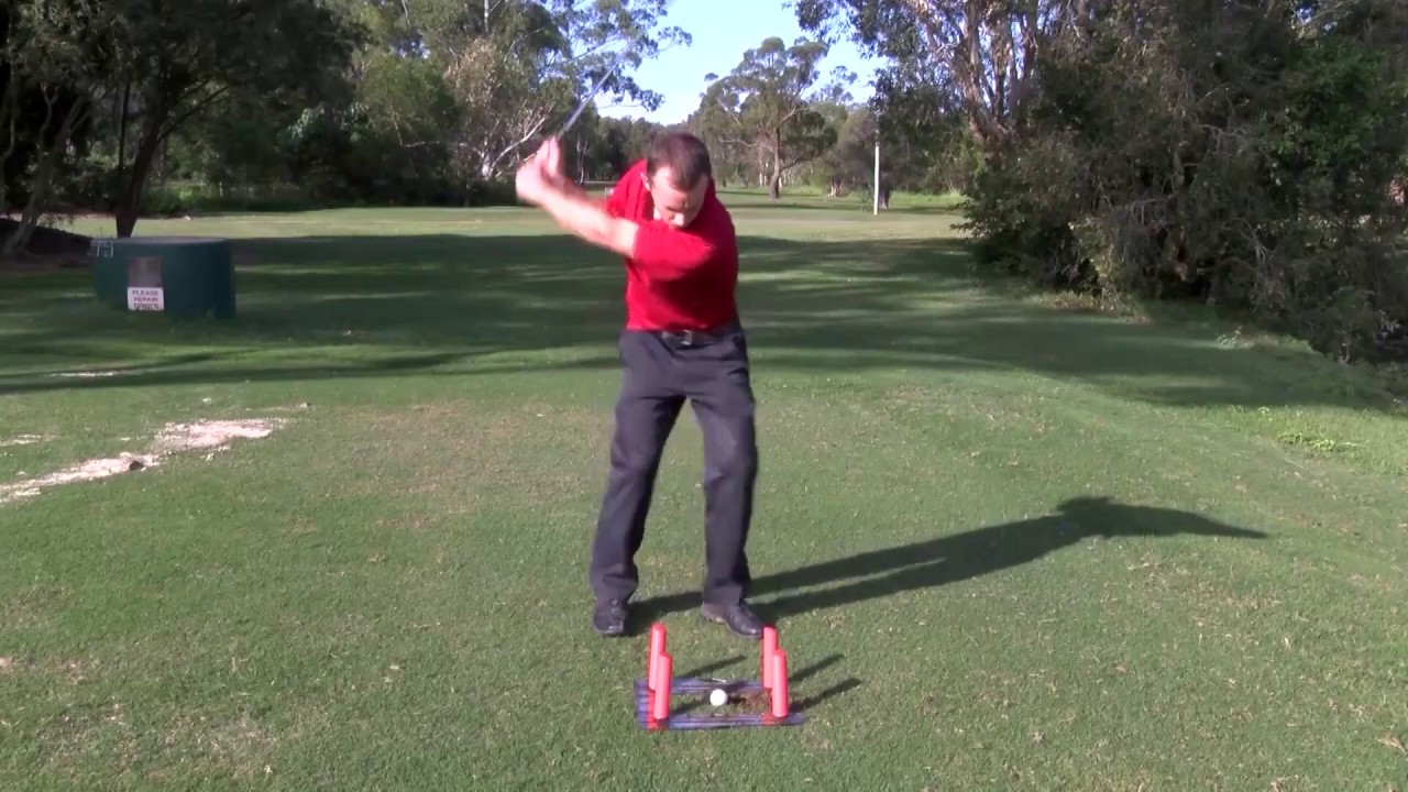 Slot It Golf Swing Trainer Using the Black DriverPoles. Slot It