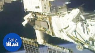 NASA astronauts conduct spacewalk on International Space Station