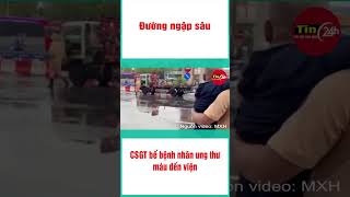 Đường ngập sâu, CSGT bế bệnh nhân ung thư máu đến viện #shorts  #tintuc #tin