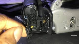 how to remove a battery stuck in camera