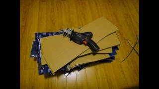 Breaking down cardboard boxes with reciprocating saw