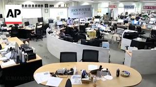 Video shows office shaking during Japan earthquake that killed at least 13