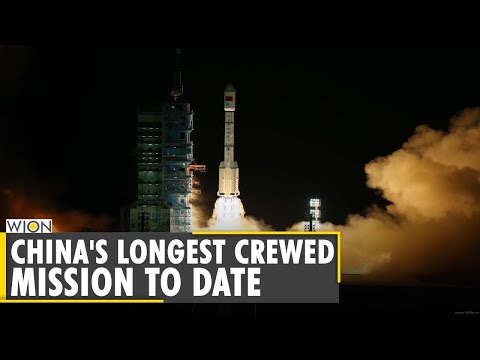 China launches three-man