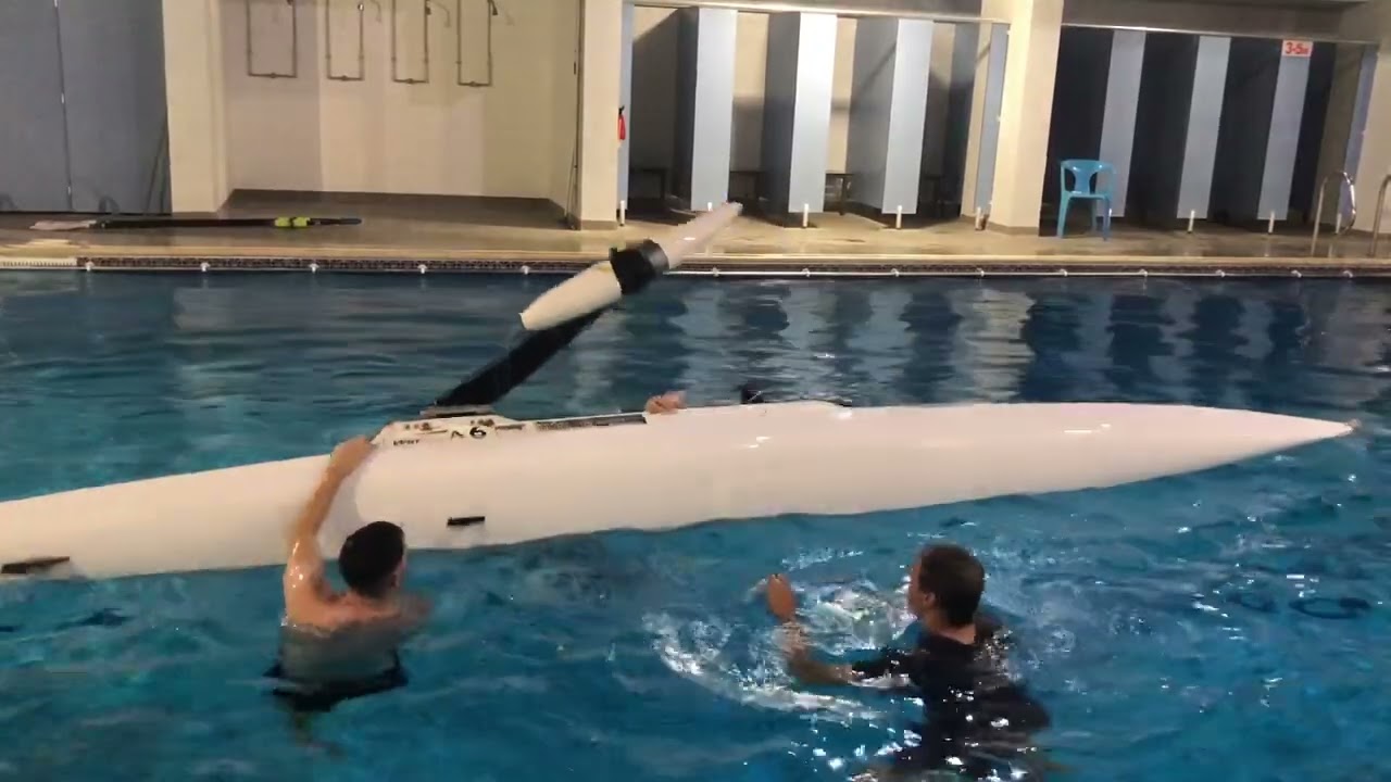 British Rowing PR1 pararowing capsize drills - strap cutting