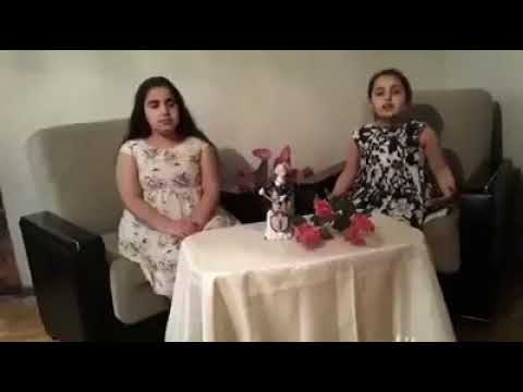 ლიის თემის N1 საჯარო სკოლის მოსწავლეები დედაზე ლექსს მხატვრულად კითხულობენ