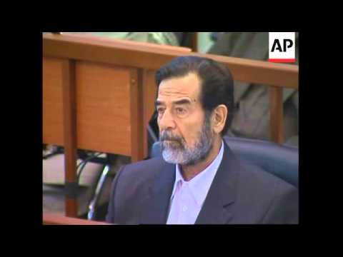 Saddam calls US denials of torture lies as trial resumes